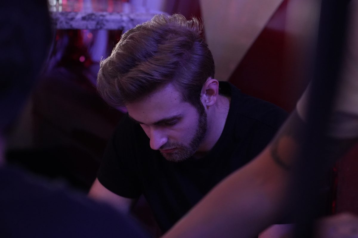Focused on a shot under purple light