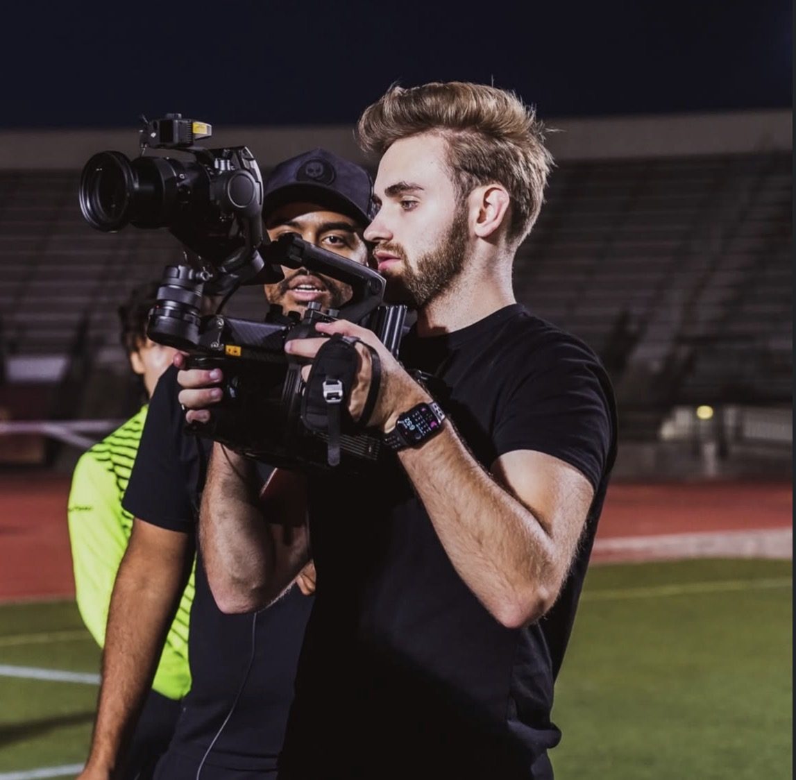 Shooting on a stadium field at night