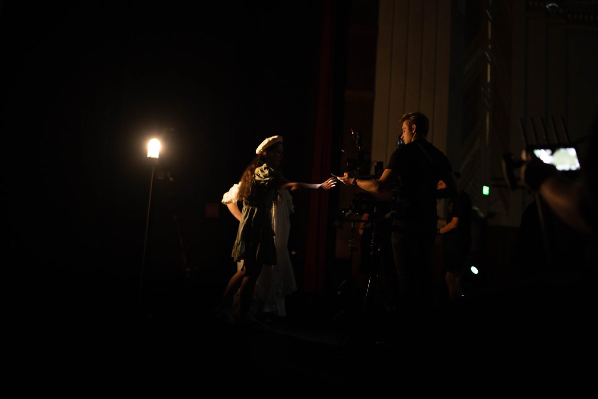 Directing two actors beside a ghost light on a darkened stage